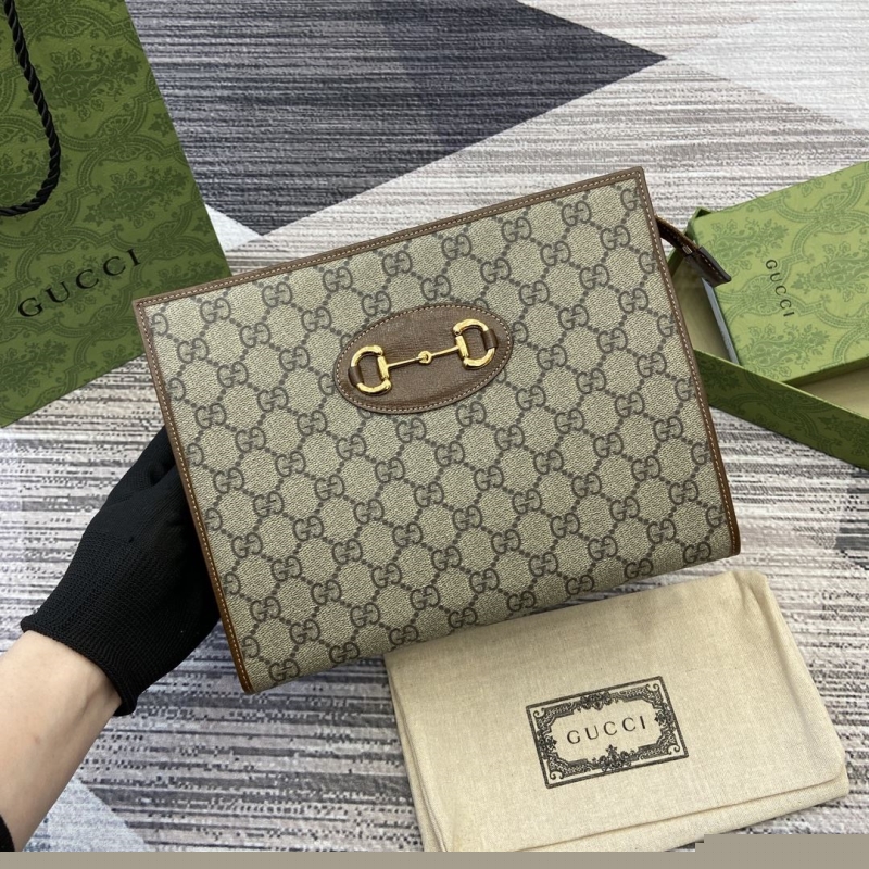 G*u*i clutch bags